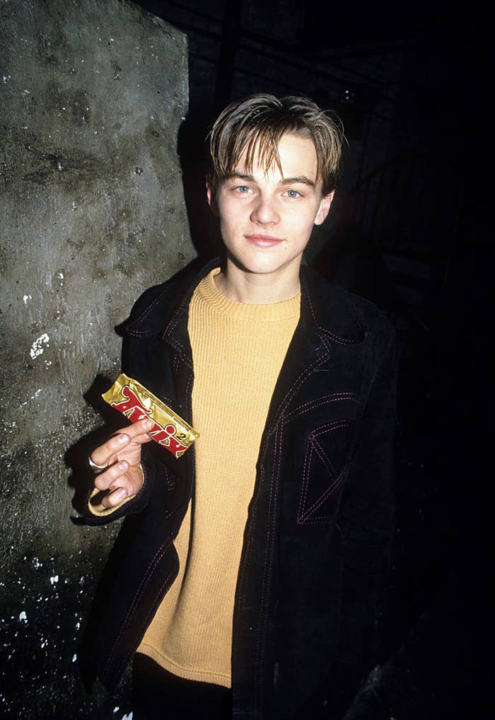 A much younger Leo holding a Twix