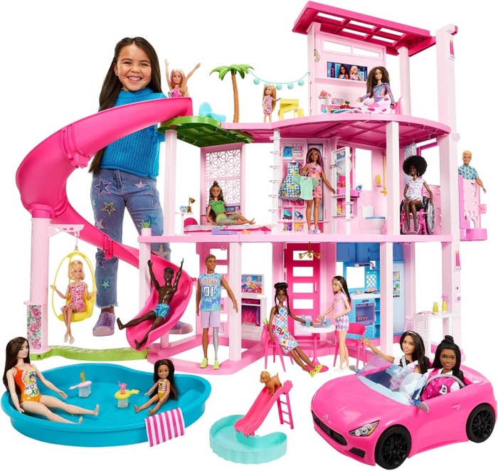 the three storey barbie dream house with all its accessories