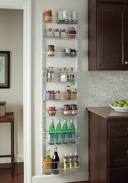 white over-the-door pantry organizer with bottled beverages