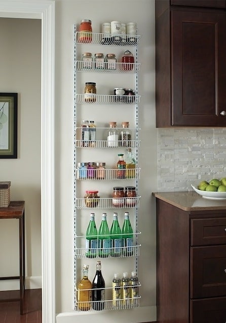 white over-the-door pantry organizer with bottled beverages
