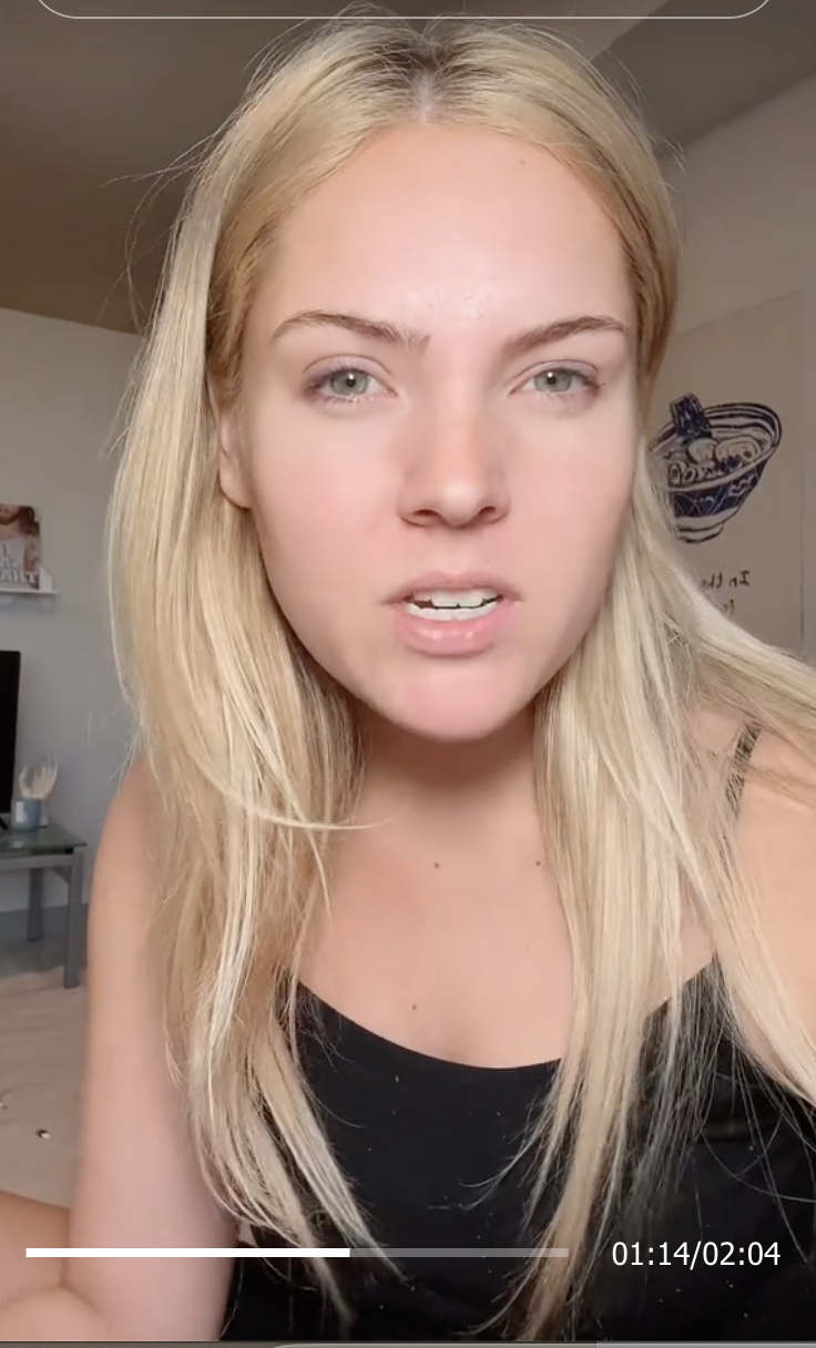 a girl talking to the camera in a tiktok video