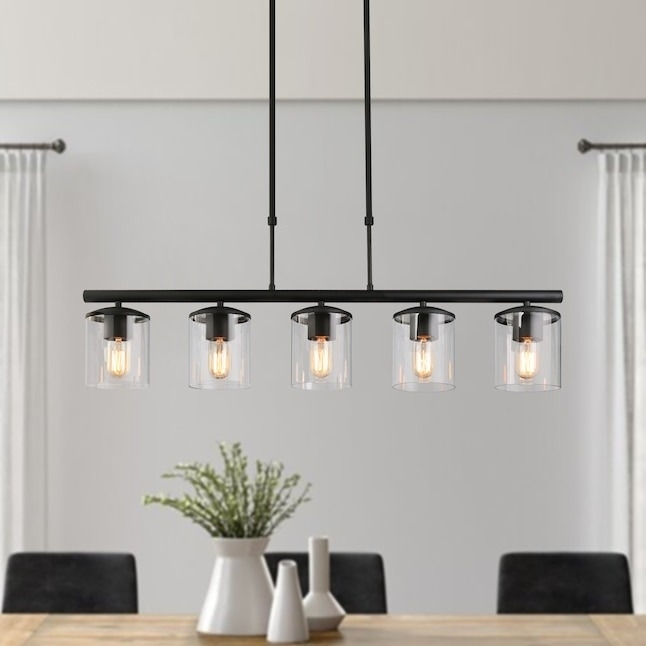 black overhead lighting fixture with five smaller lamps above dining table