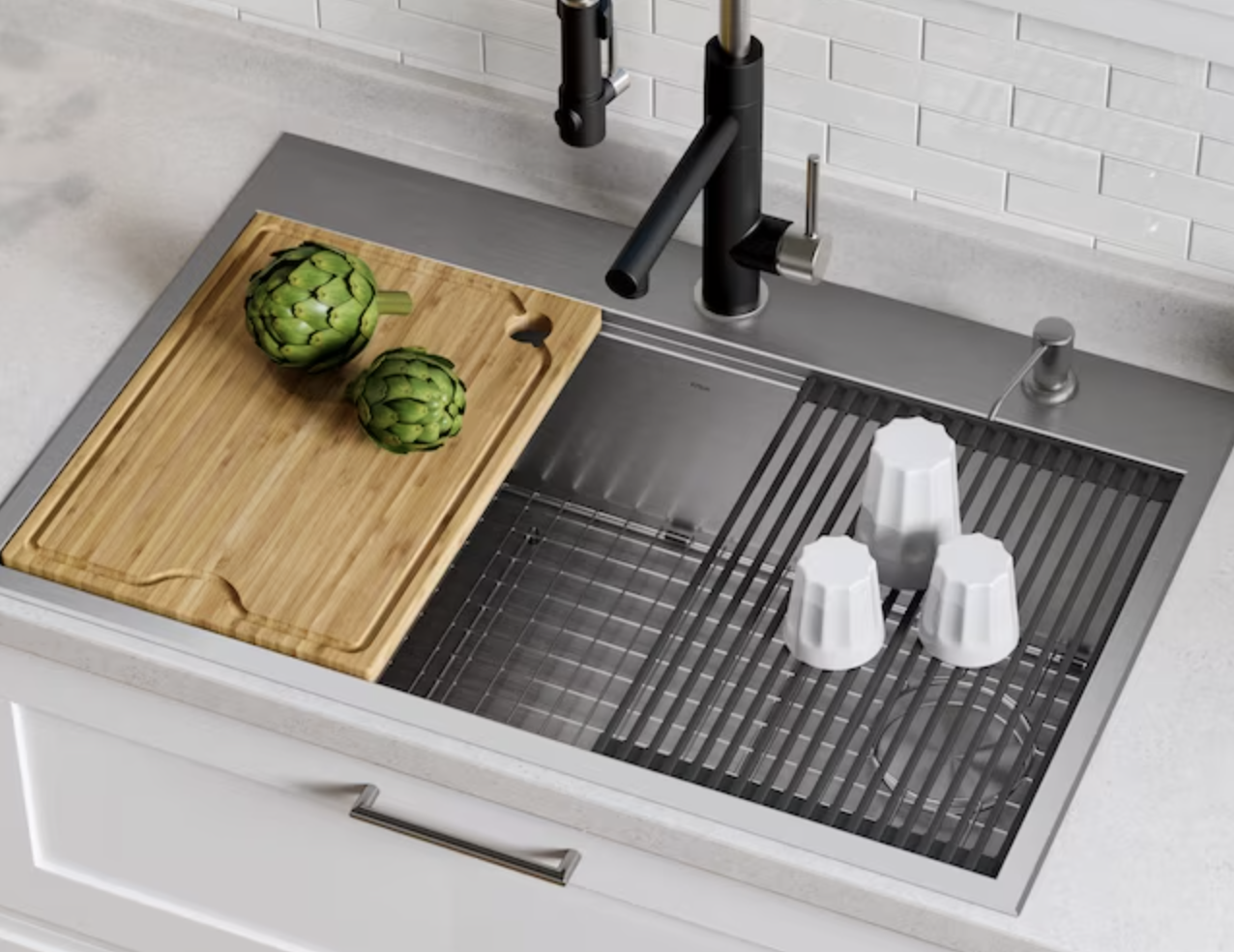 workstation kitchen sink with one side for prepping veggies and the other for drying dishes