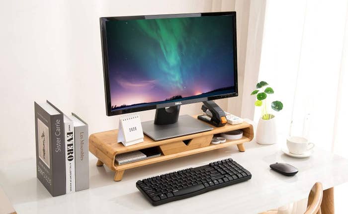 bamboo computer monitor stand with small storage shelves