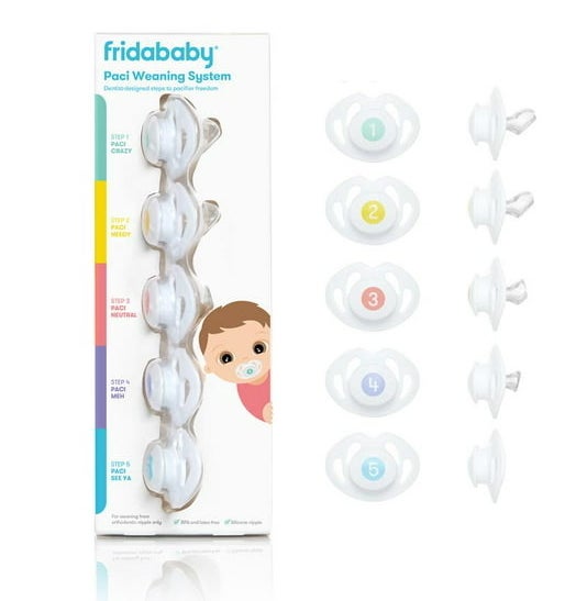 five white pacifiers with numbers indicating the stage of pacifier weaning