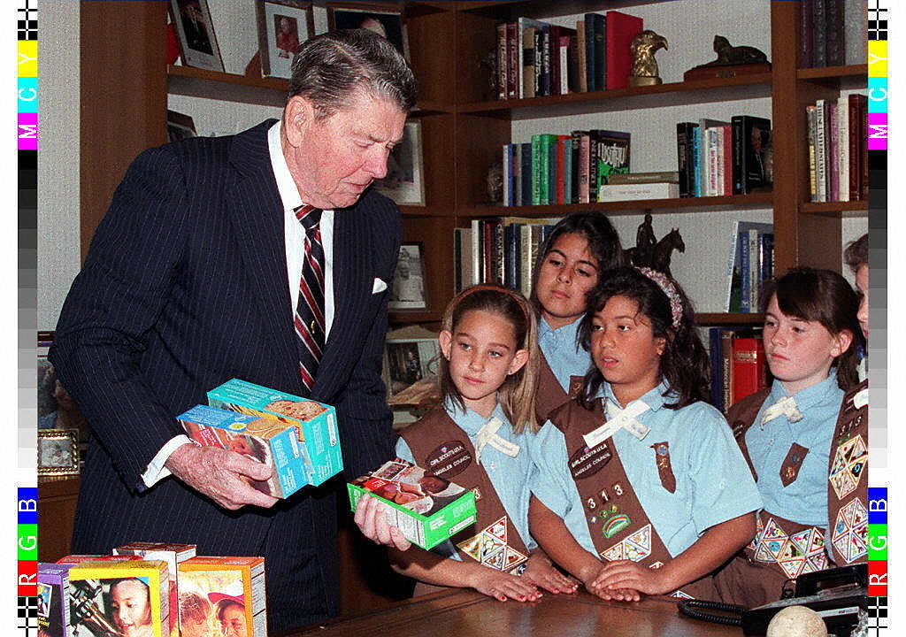girl scout troupe delivering cookies to Ronald Reagan