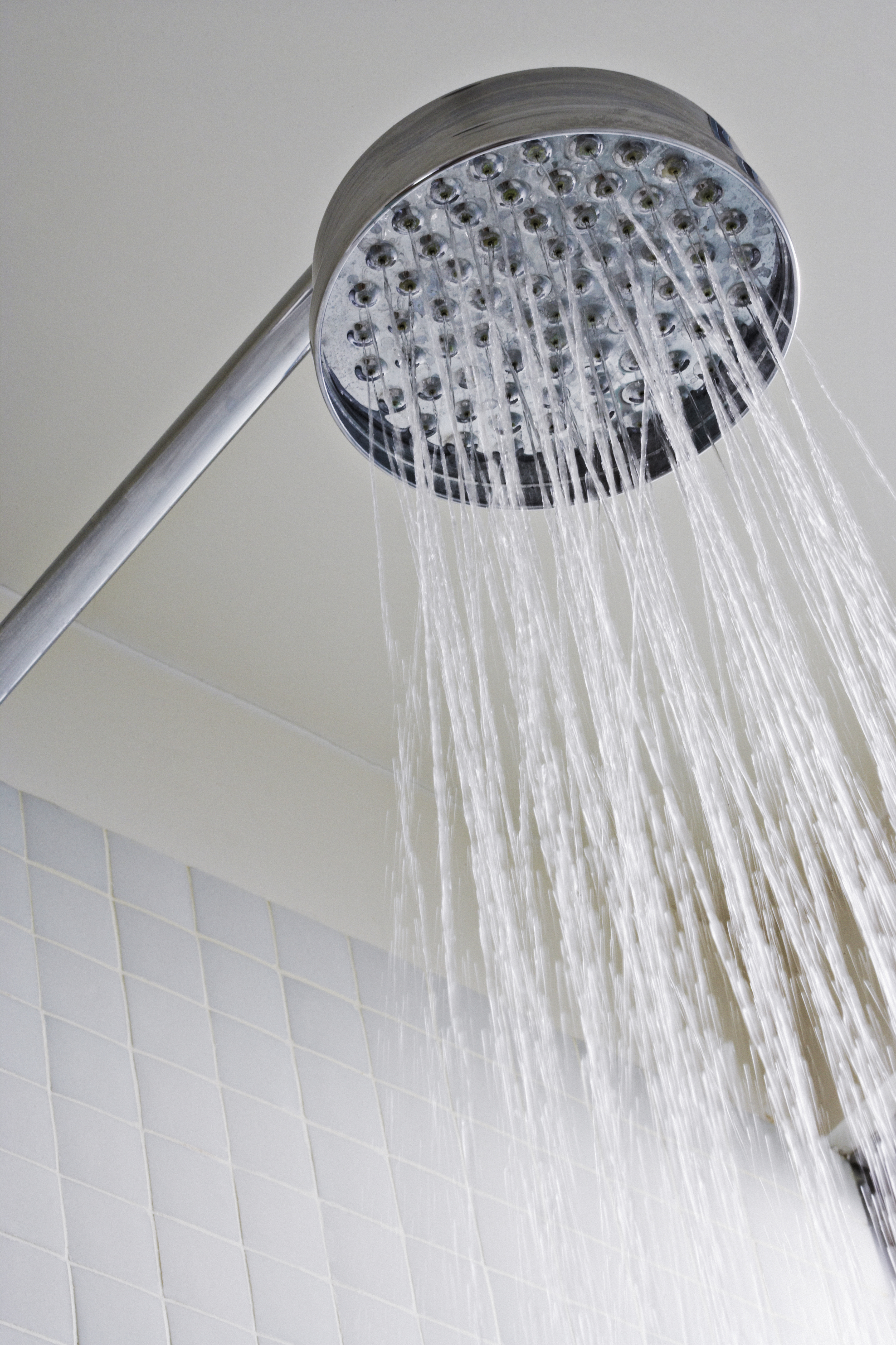 A showerhead with water running