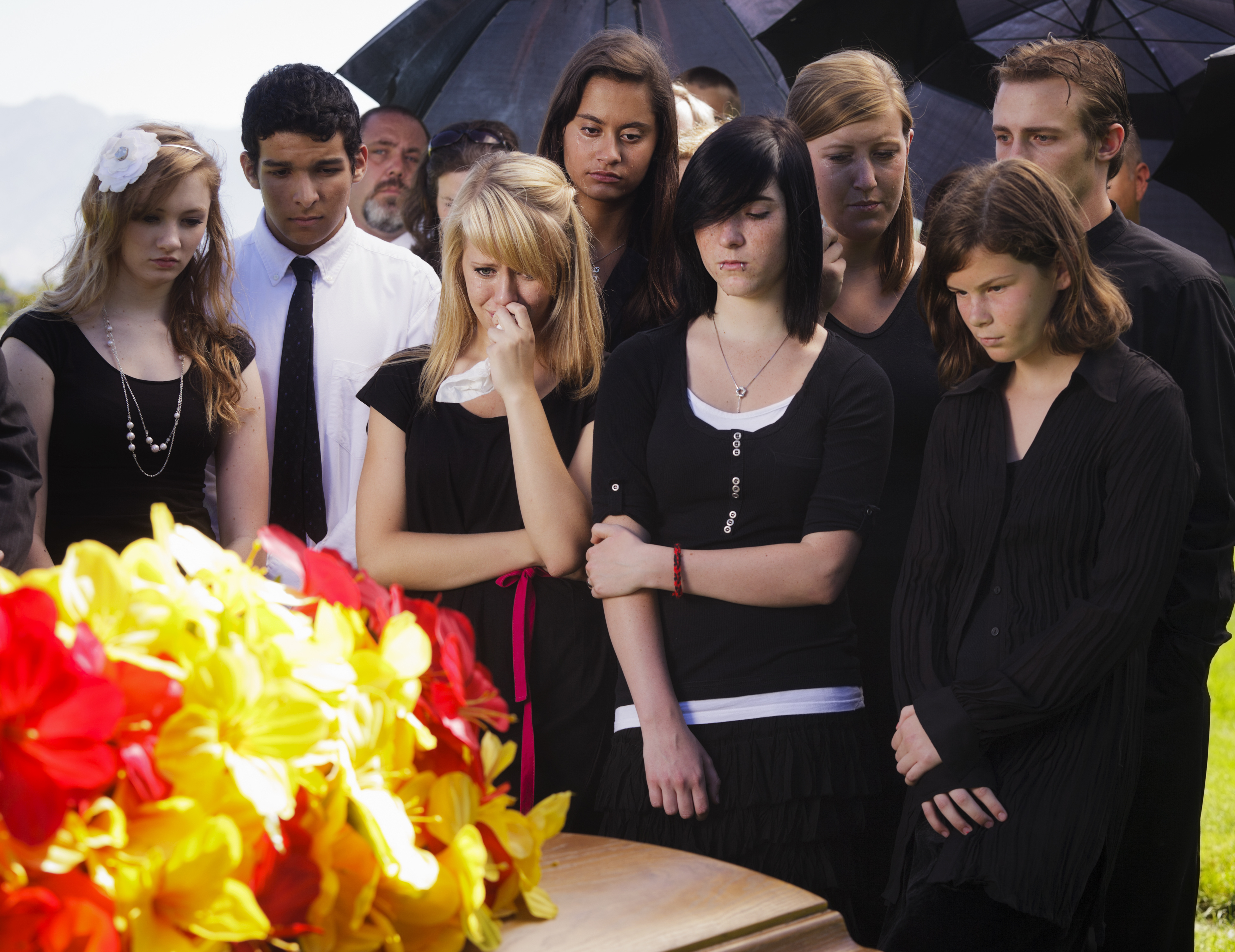 teens at a funeral