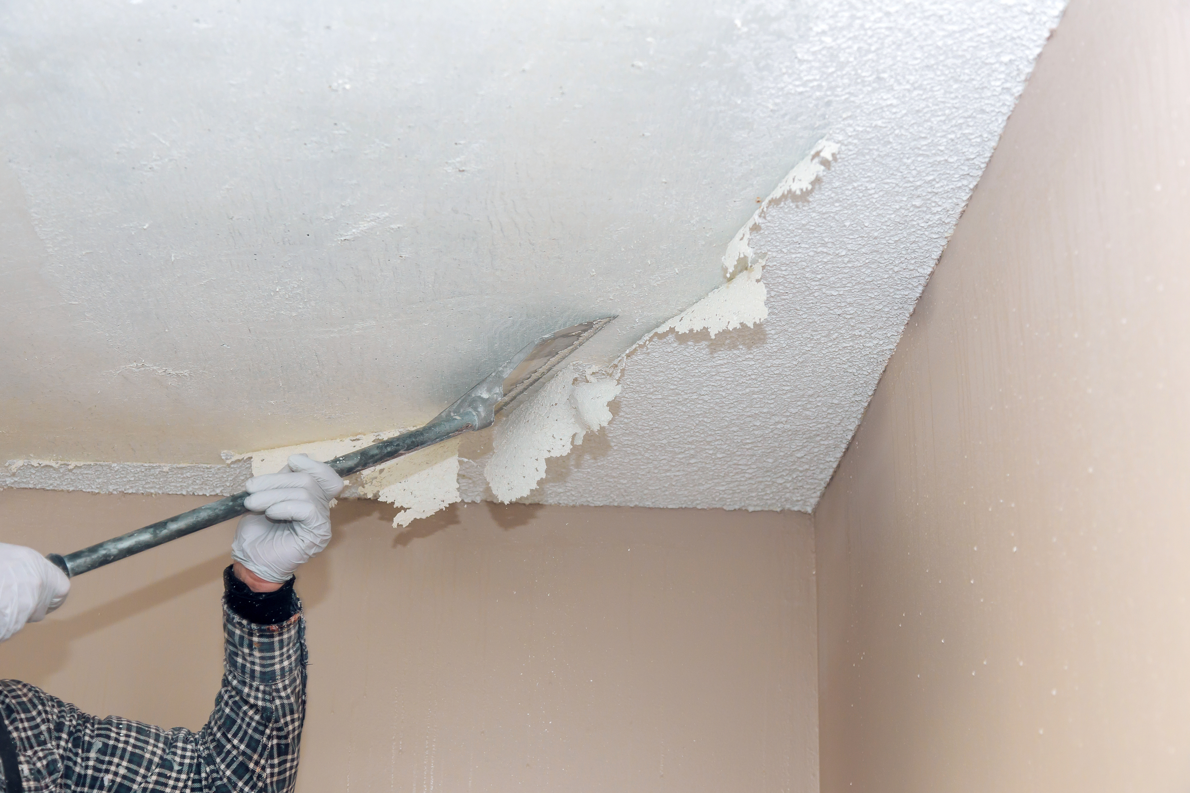 Scraping popcorn ceiling off