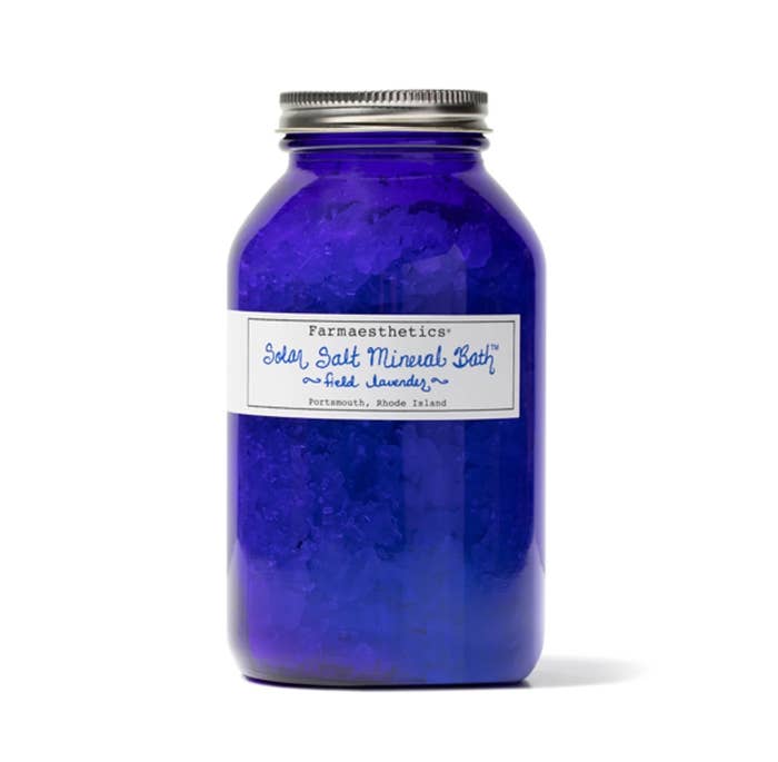 blue glass jar of bath salts