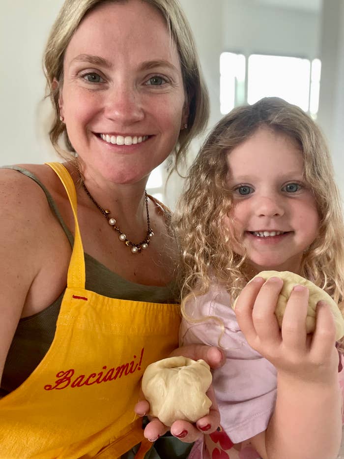 the author and her daughter working with dough