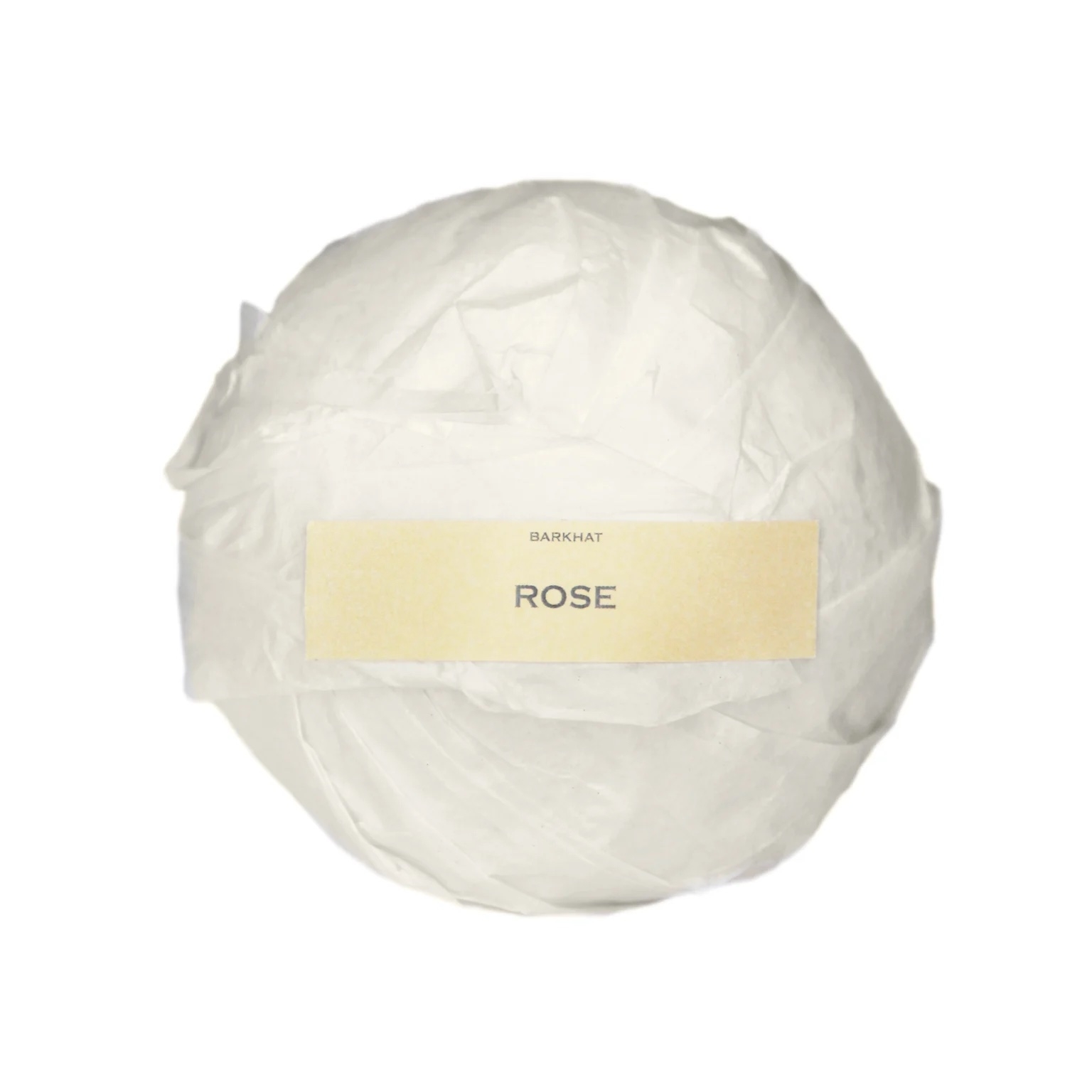 the rose bath bomb wrapped in white paper