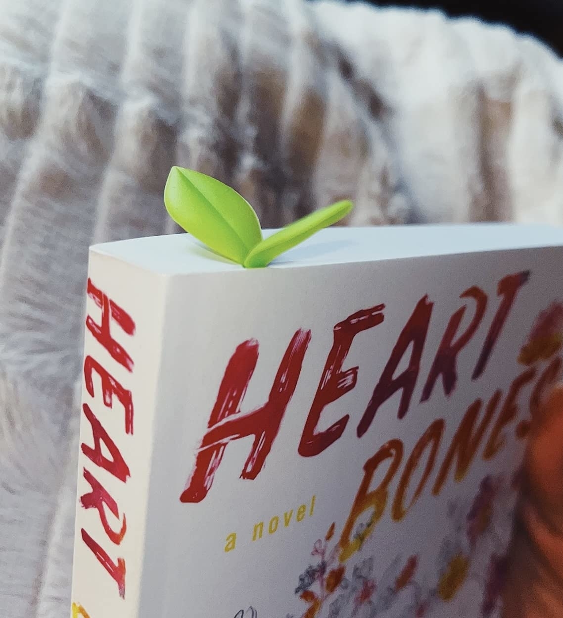 The sprout bookmark in a reviewer&#x27;s book