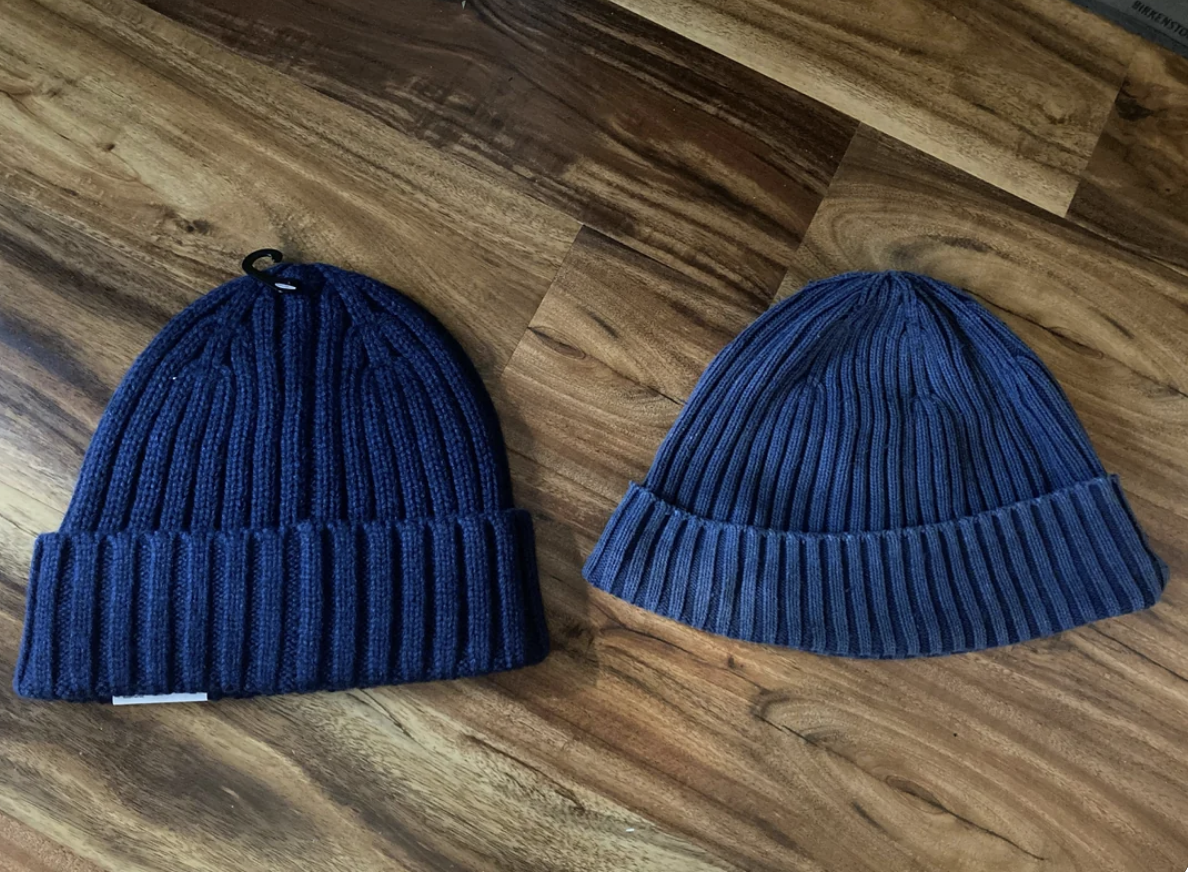The older beanie is a lighter blue and looks as if its lost some of its elasticity