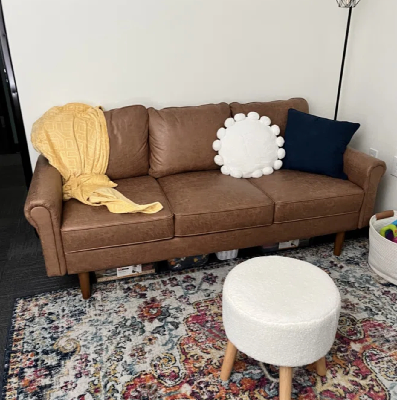 A reviewer&#x27;s vegan leather sofa