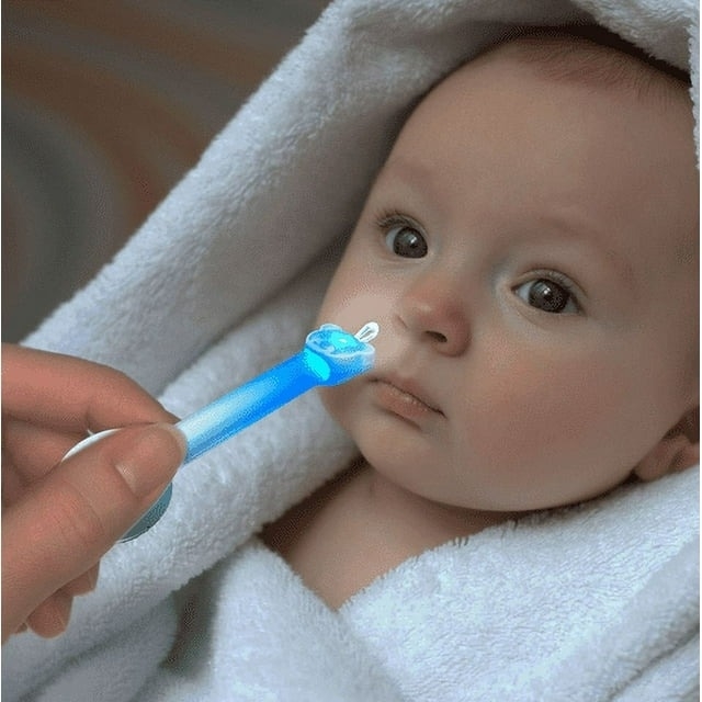 model using blue nose cleaner to clean baby&#x27;s nose