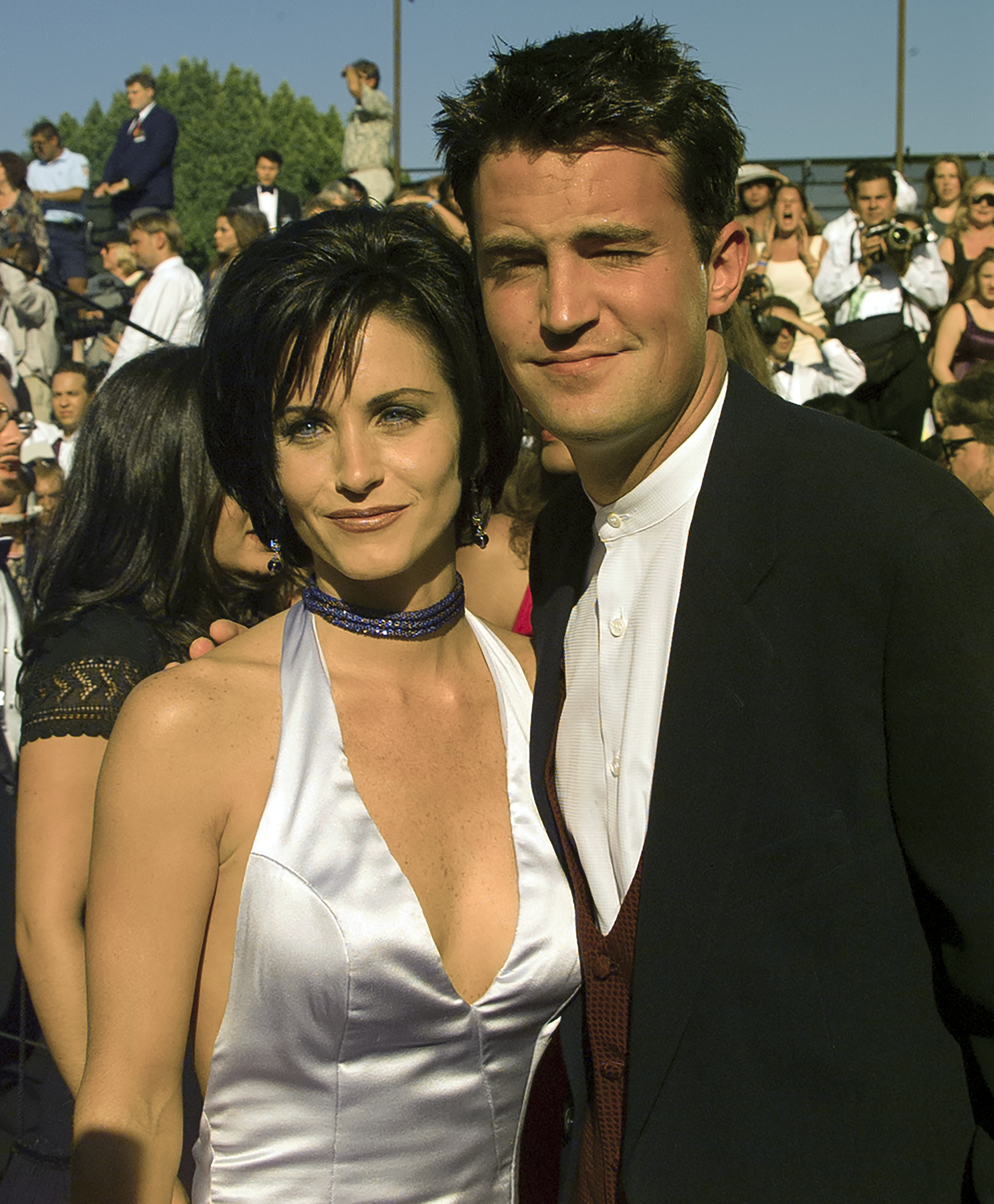 Closeup of Courteney Cox and Matthew Perry at a media event