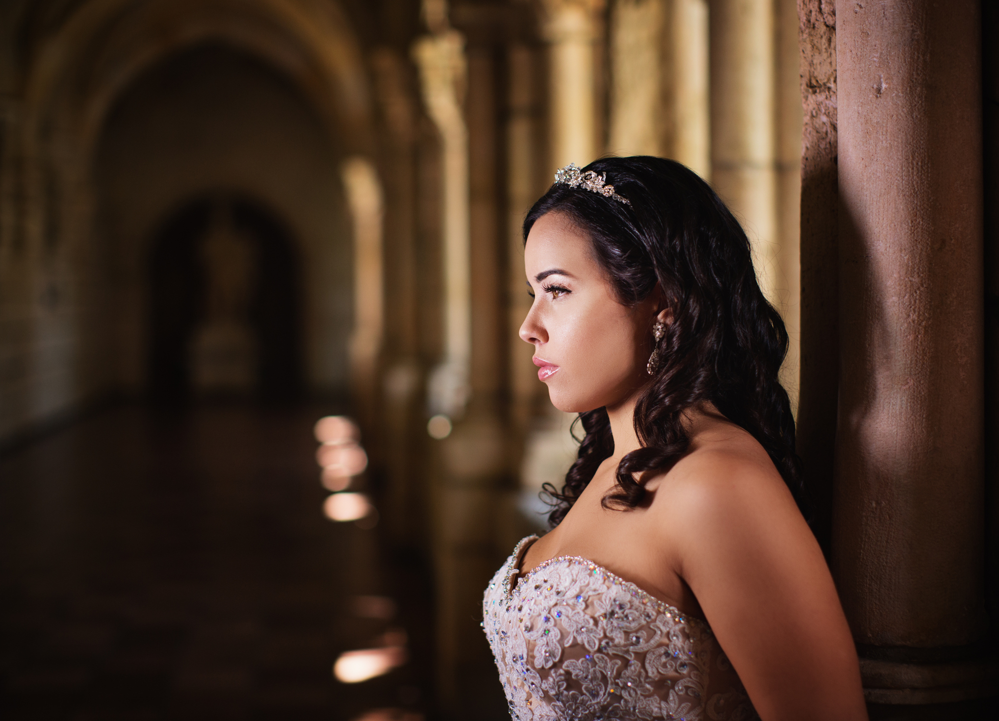 A girl on her quinceañera day looking pensive