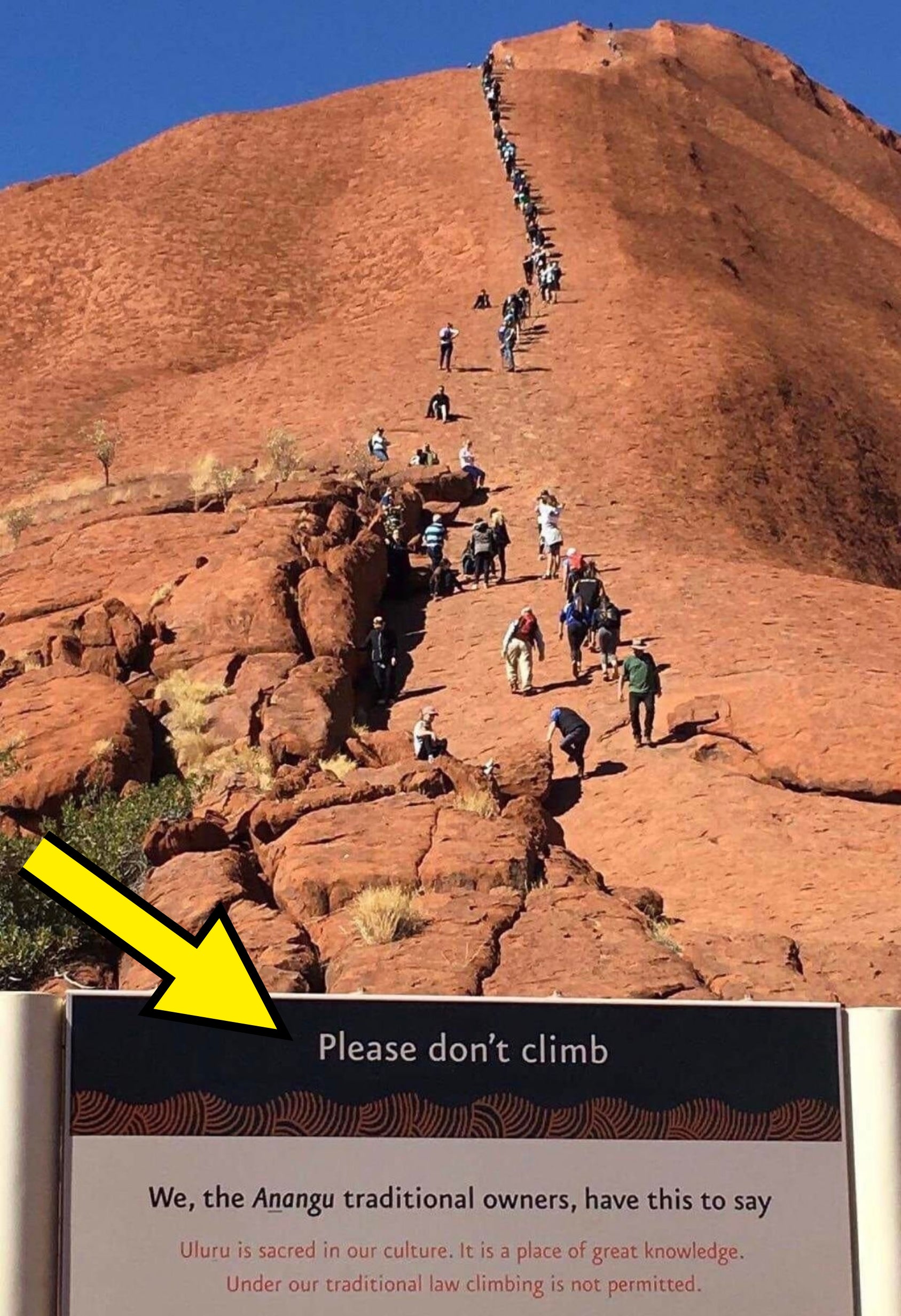 People climbing a hill they're not supposed to