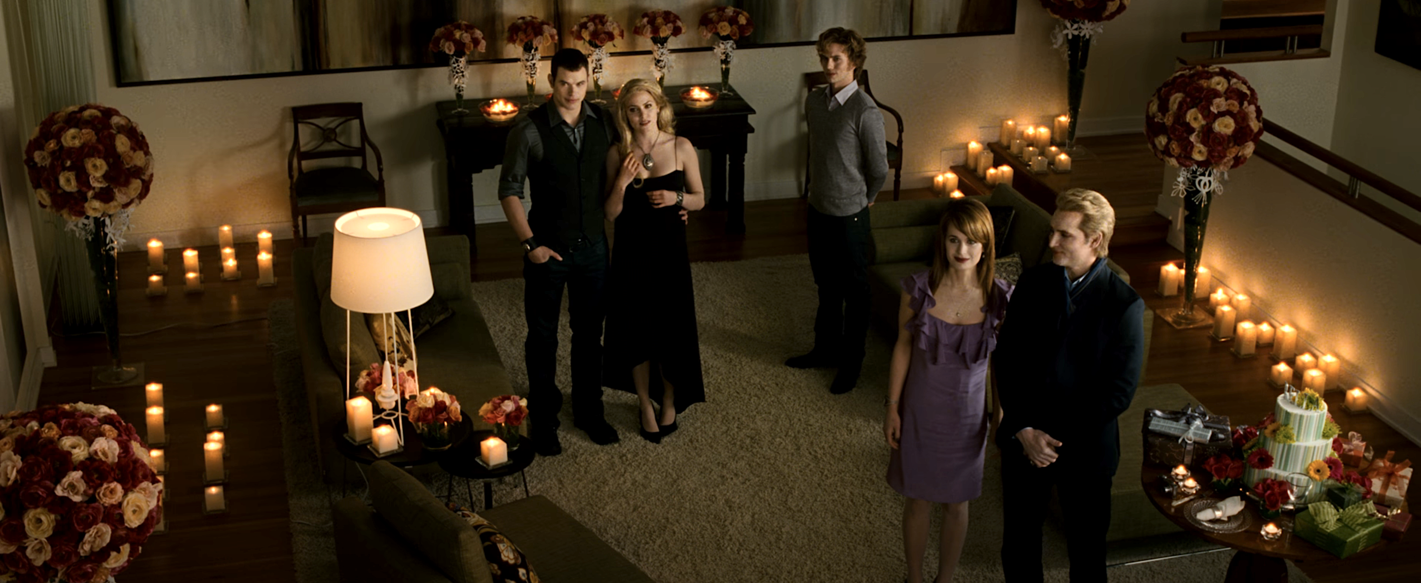 The Cullen family standing in their living room