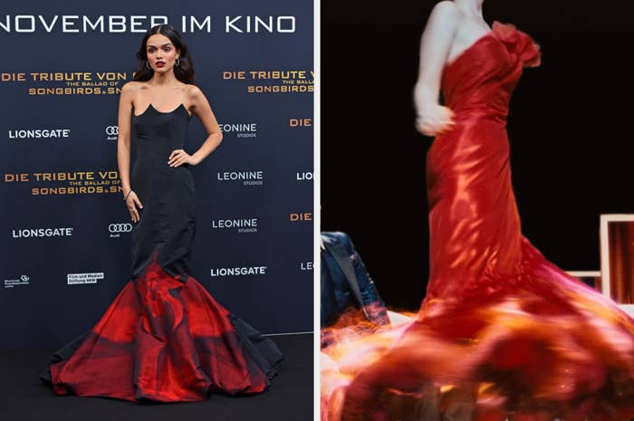 she&#x27;s in a strapless gown that is made to resemble flames from the bottom