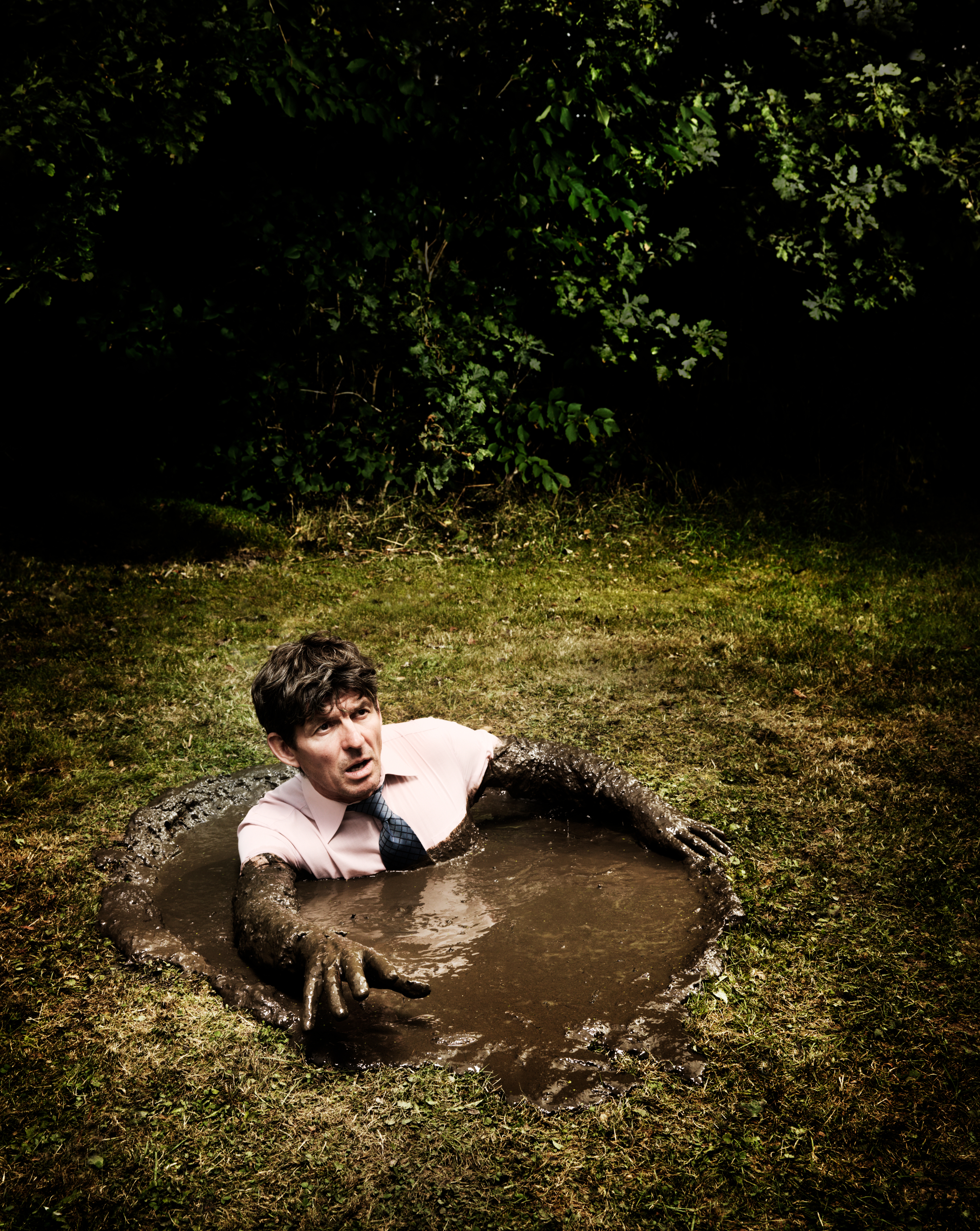 A man in a large puddle