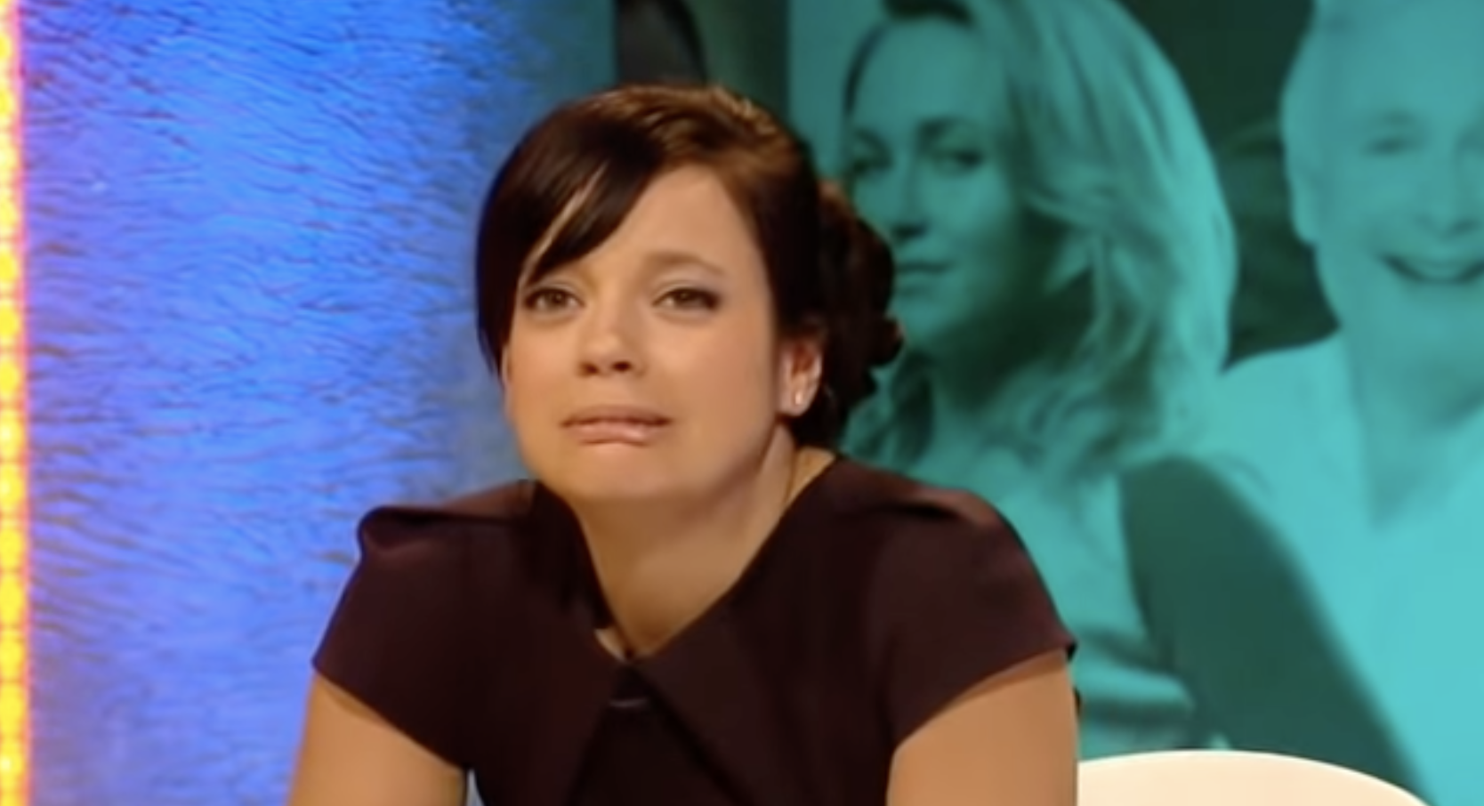Closeup of Lily Allen cringing
