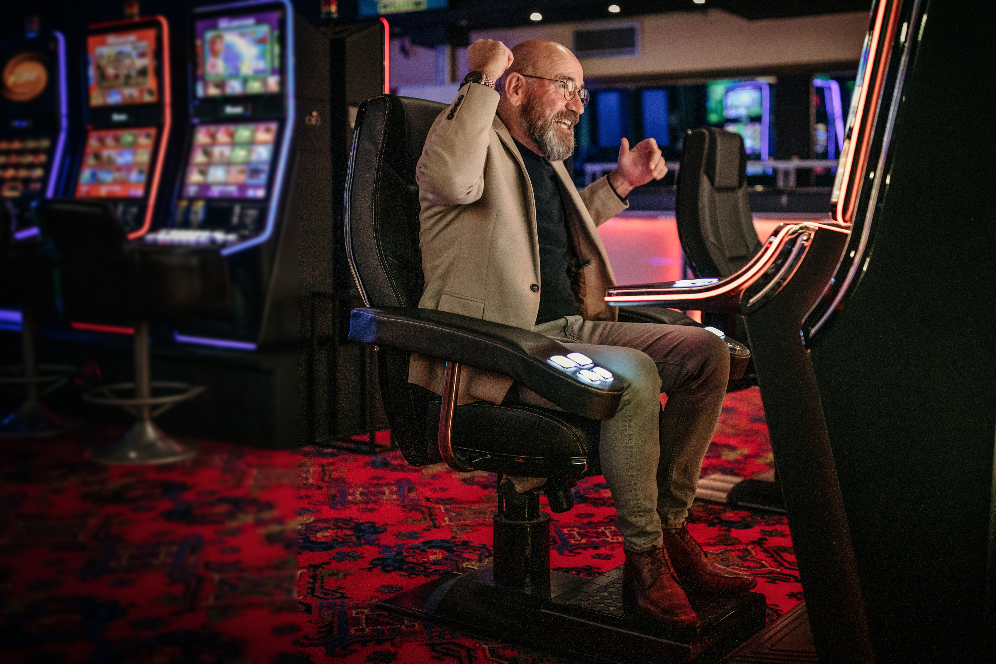 a man using a slot machine
