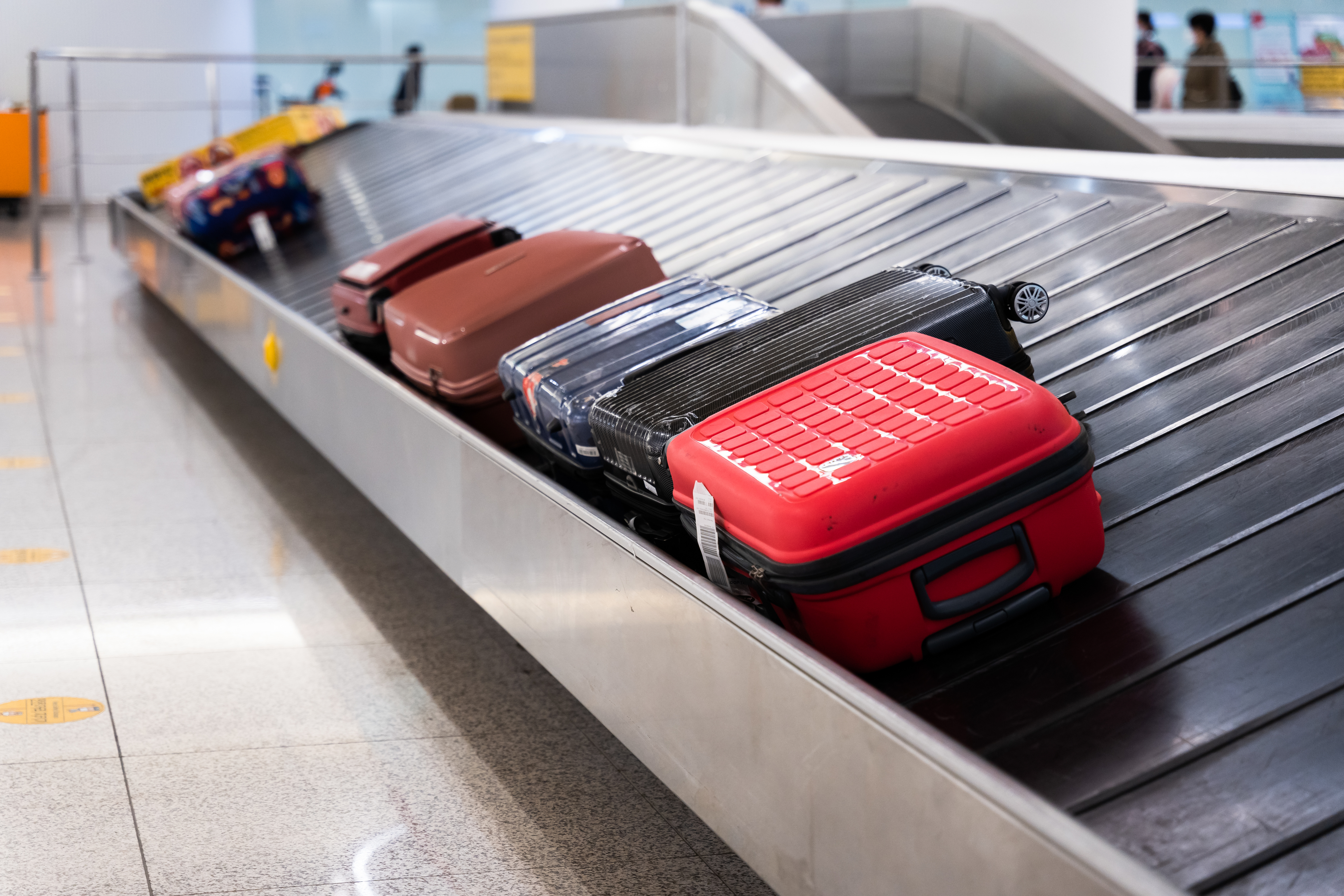 Luggage in the baggage claim carousel
