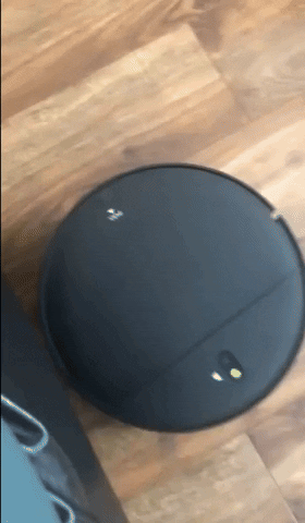 gif of reviewer's vacuum on hard wood and carpet