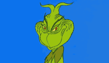 The grinch cartoon smiling mischievously