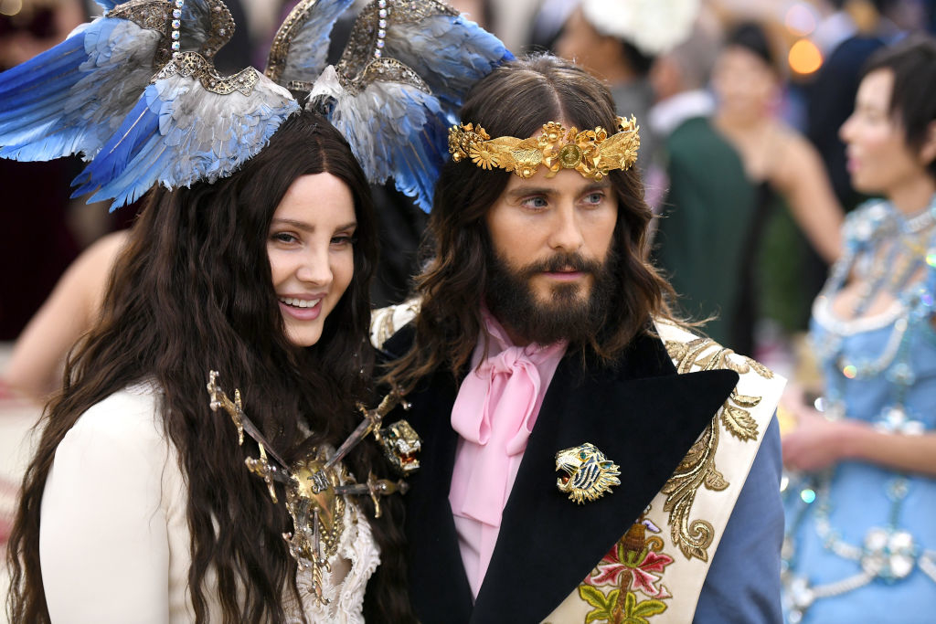 Close-up of Jared in 2018 in the embroidered jacket standing with Lana Del Rey
