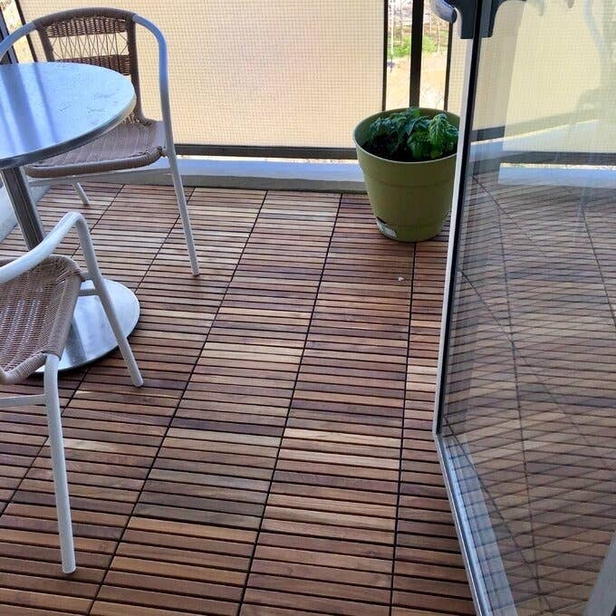 the wood level tiles installed connected a deck