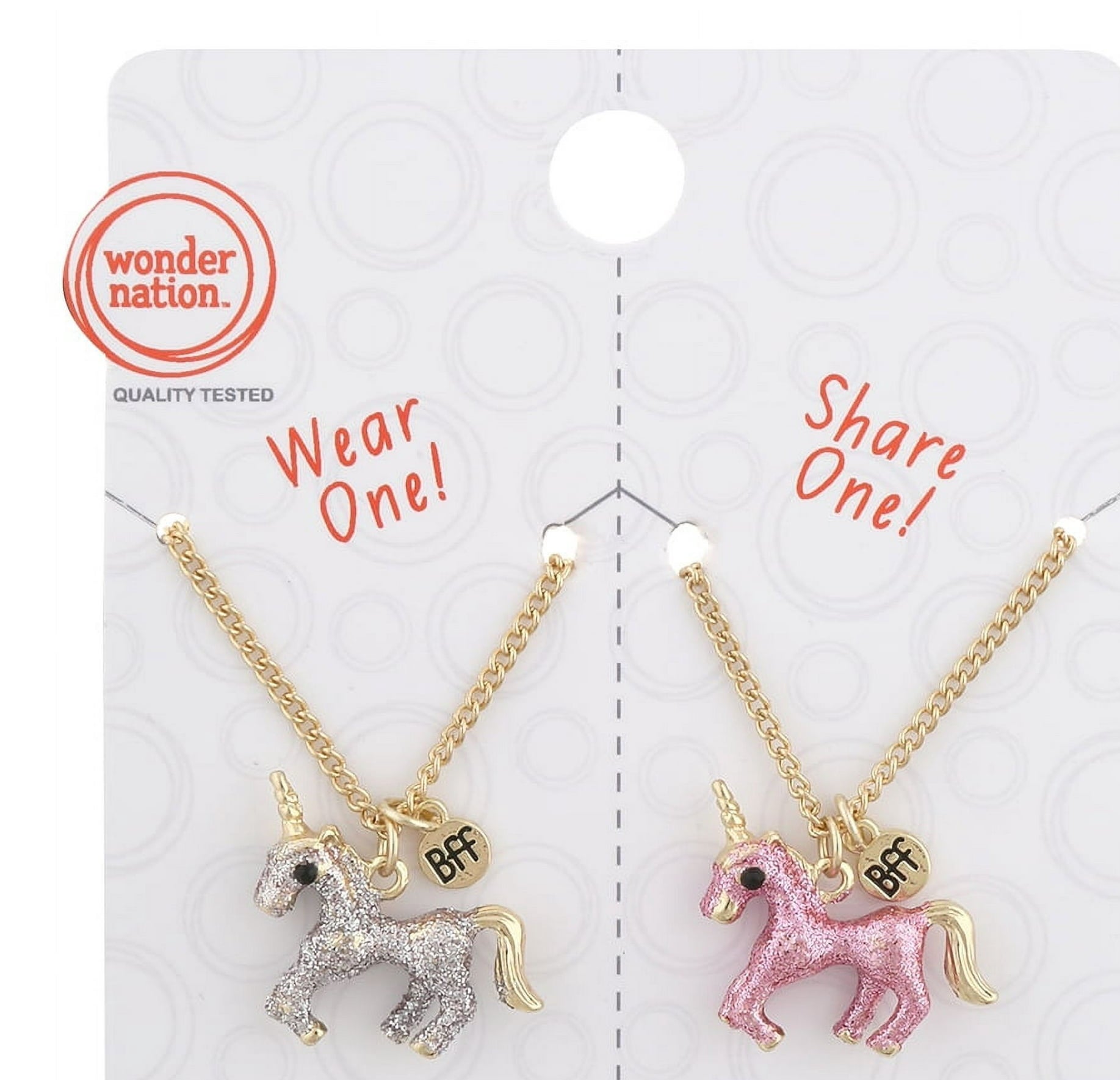 two necklaces one a silver unicorn and the other a pink unicorn on a gold chain