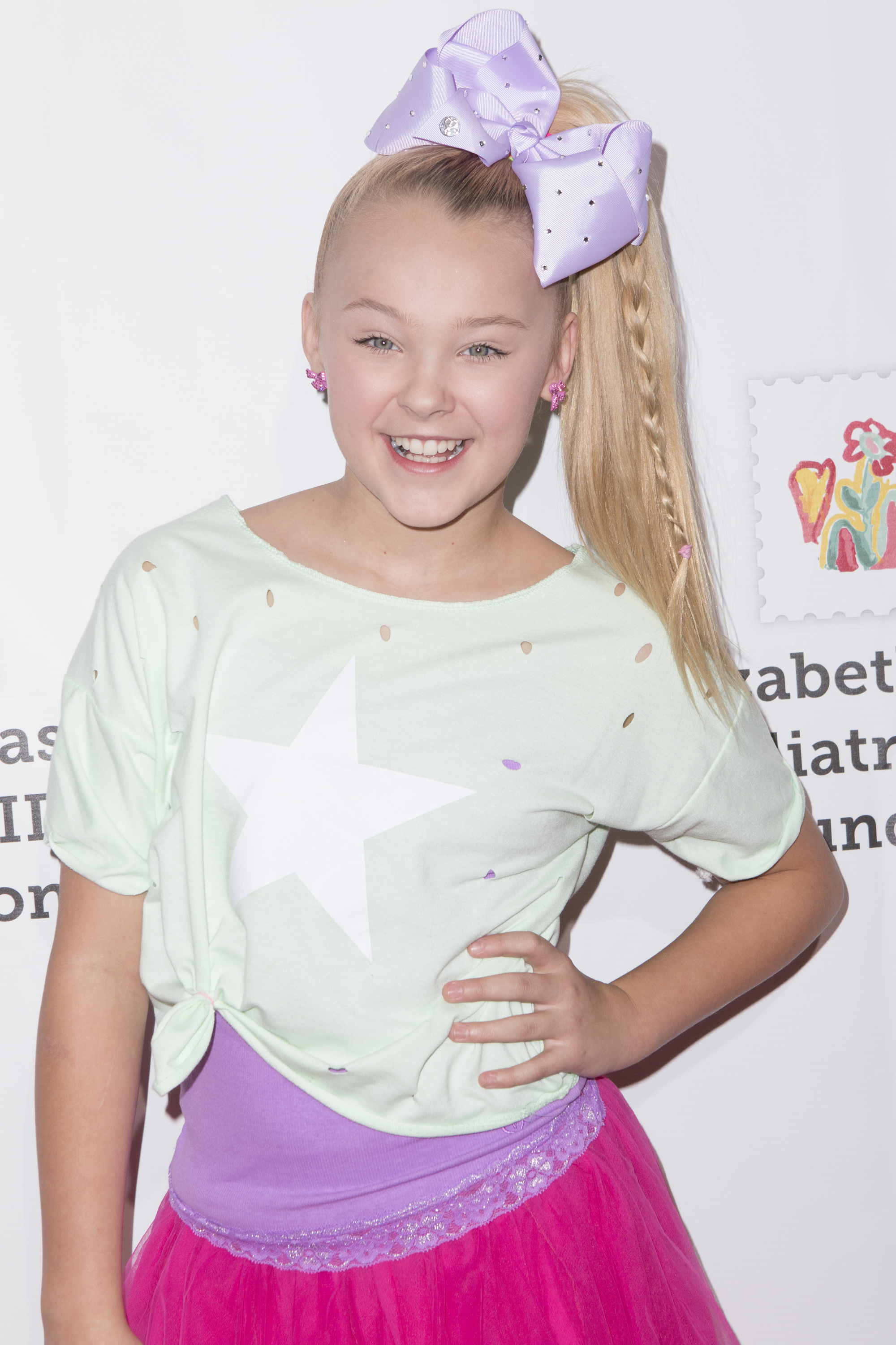 Closeup of JoJo Siwa on the red carpet