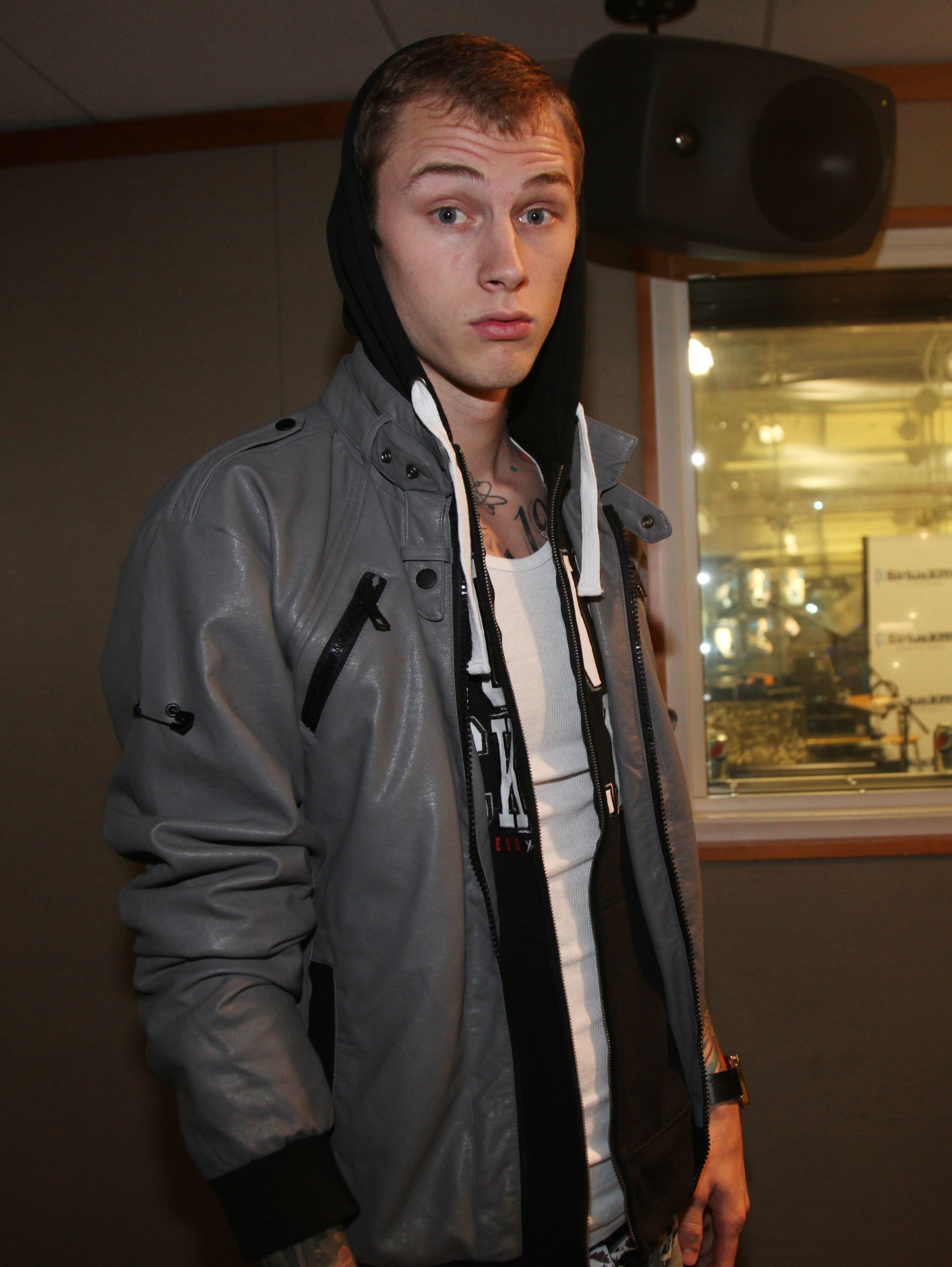 closeup of a younger MGK