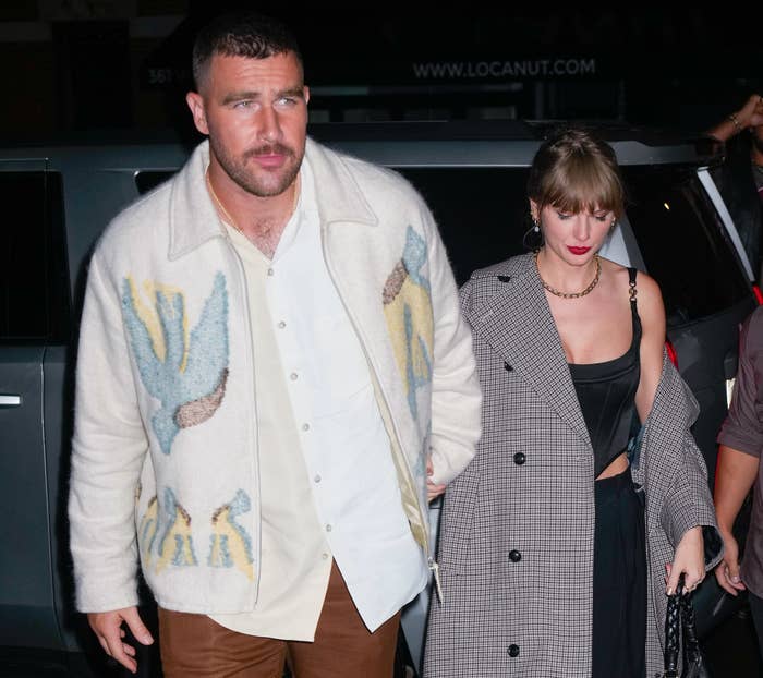 him and taylor holding hands