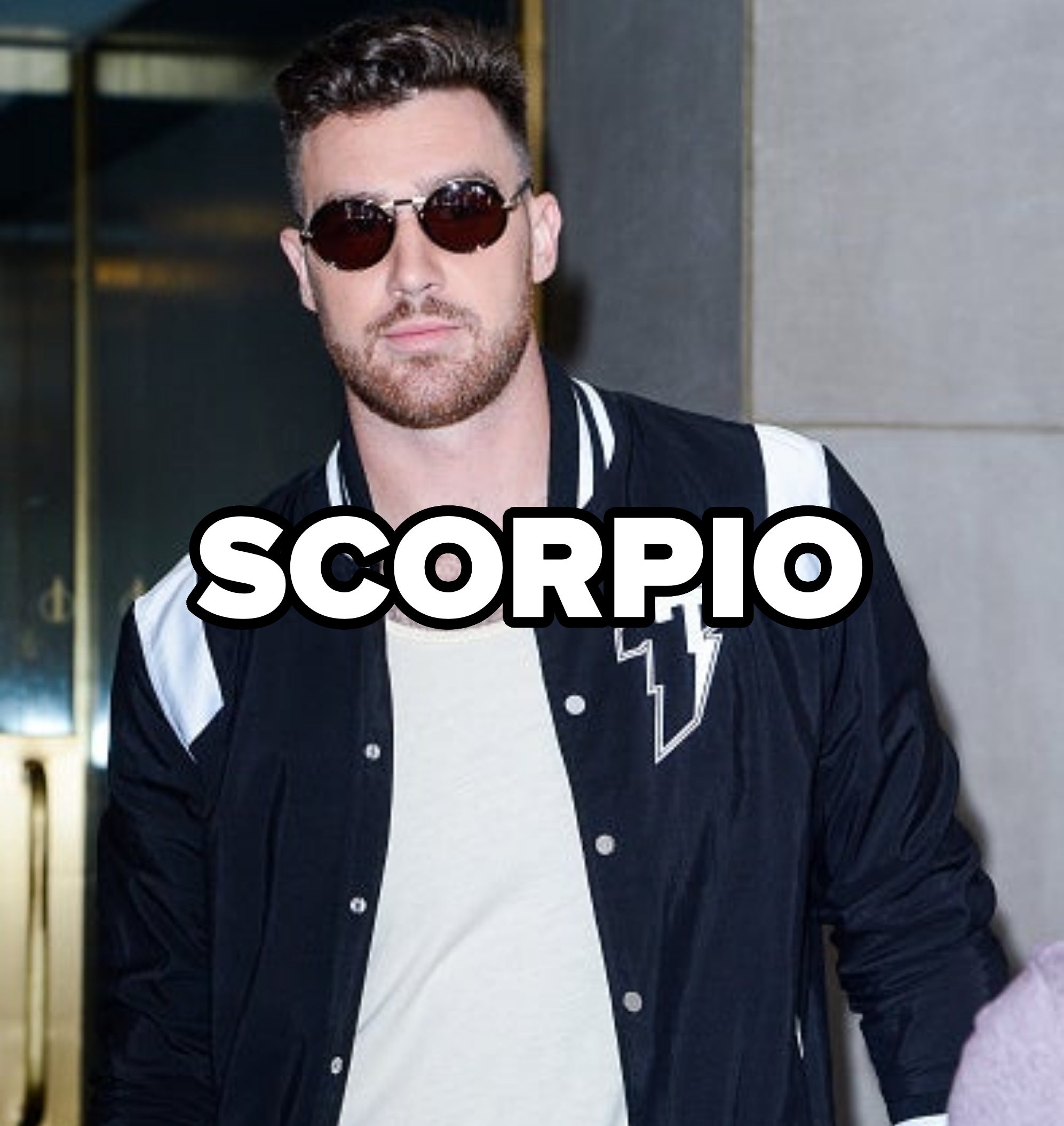 scorpio written over a photo of him at night wearing sunglasses and jacket