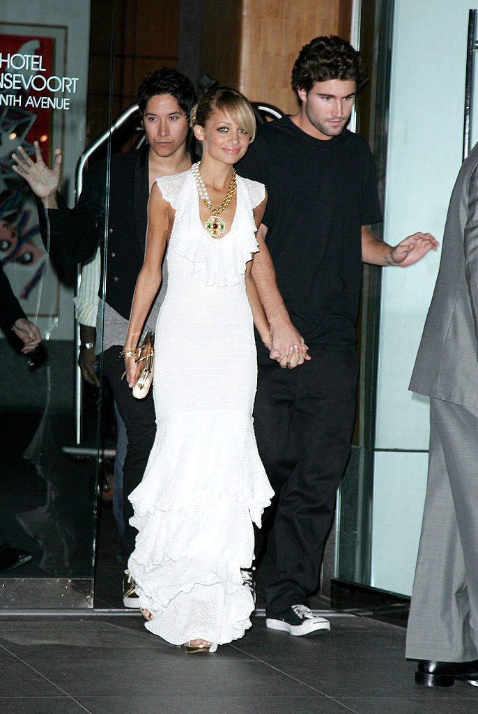 Nicole Richie and Brody Jenner exiting a building