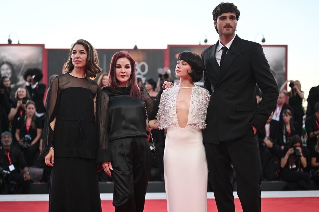 Jacob almost two heads taller than Priscilla Presley, Cailee Spaeny, and Sofia Coppola on the red carpet