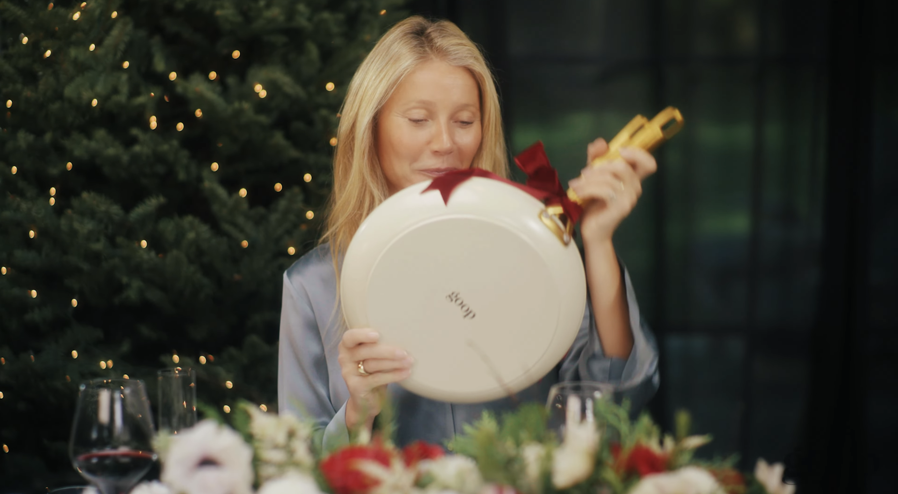 Closeup of Gwyneth Paltrow holding a pan