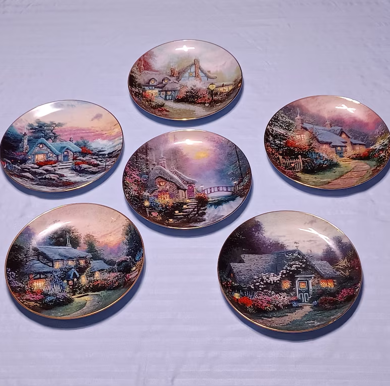 Six plates in a circle with homey and snowy Christmas scenes