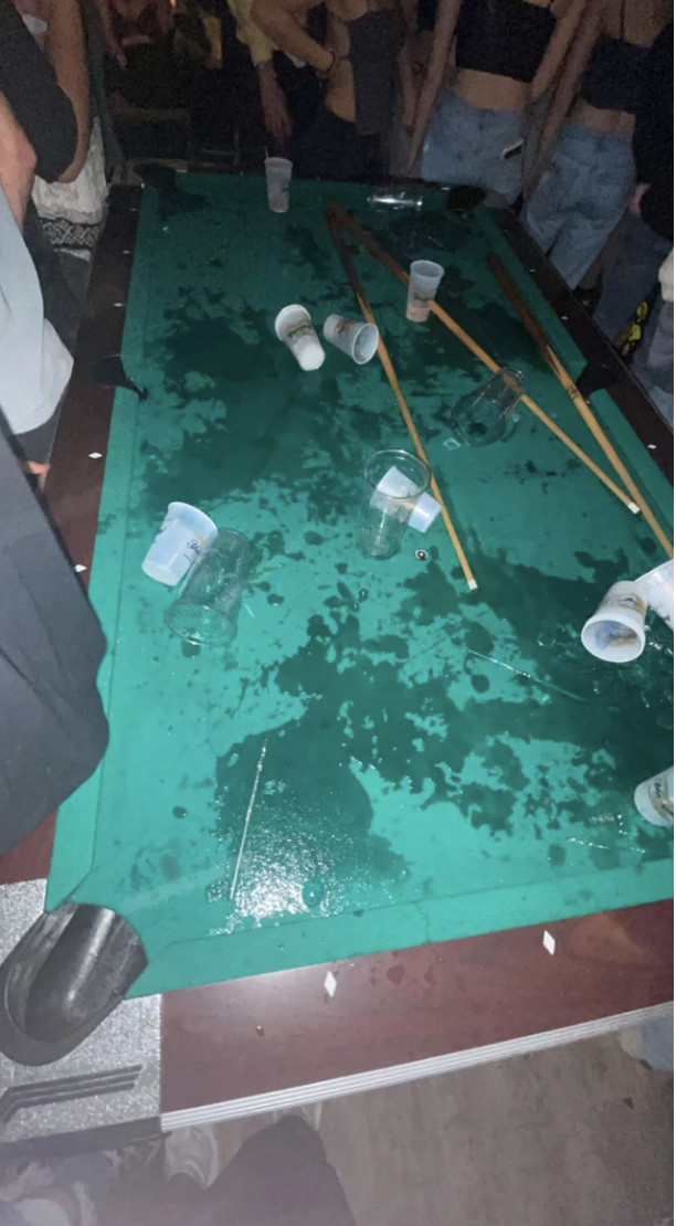 drinks spilled all over the pool table