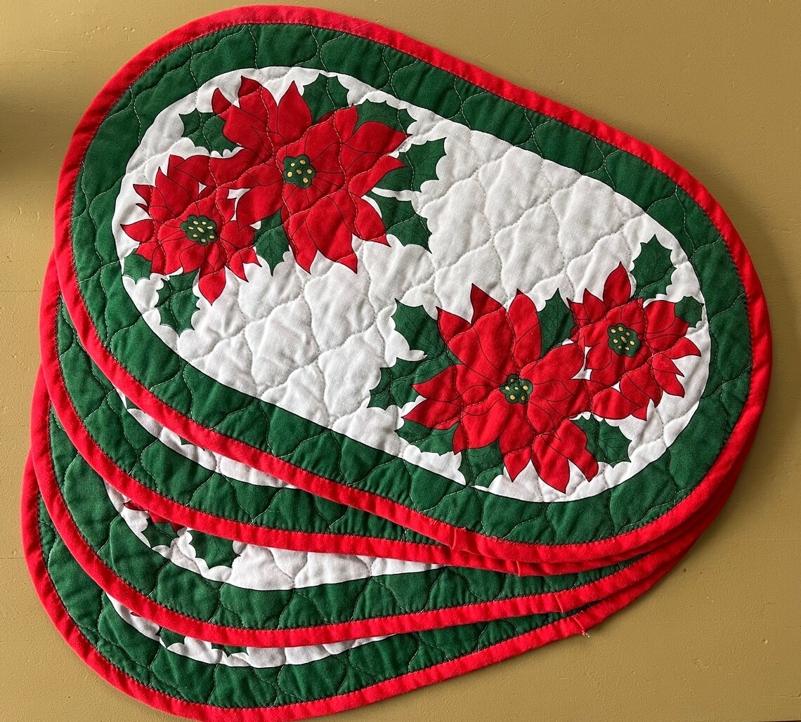 Several poinsettia placemats