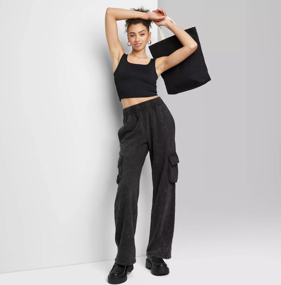 model wearing black high-waisted cargo pants