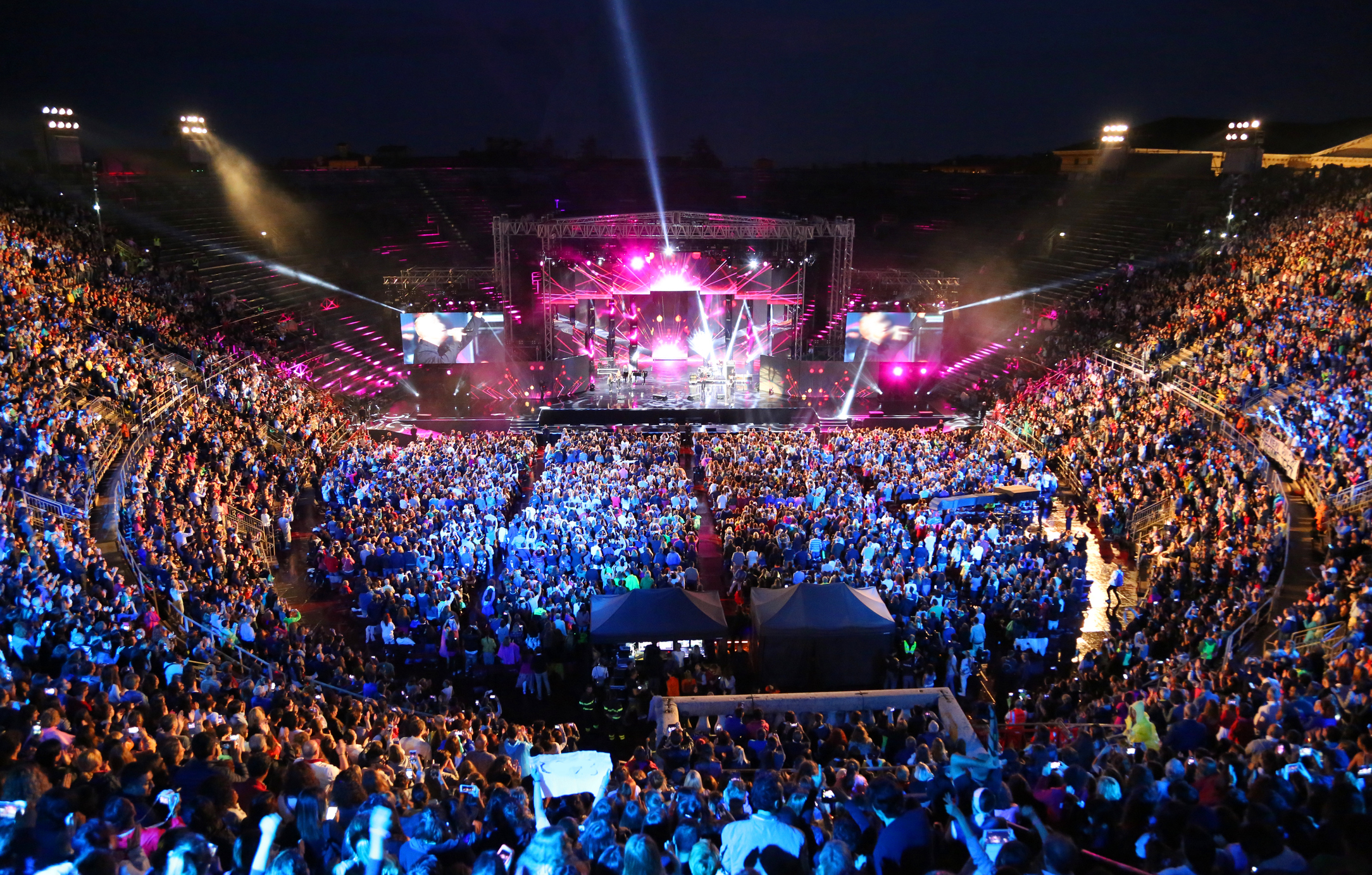arena full of fans during a show