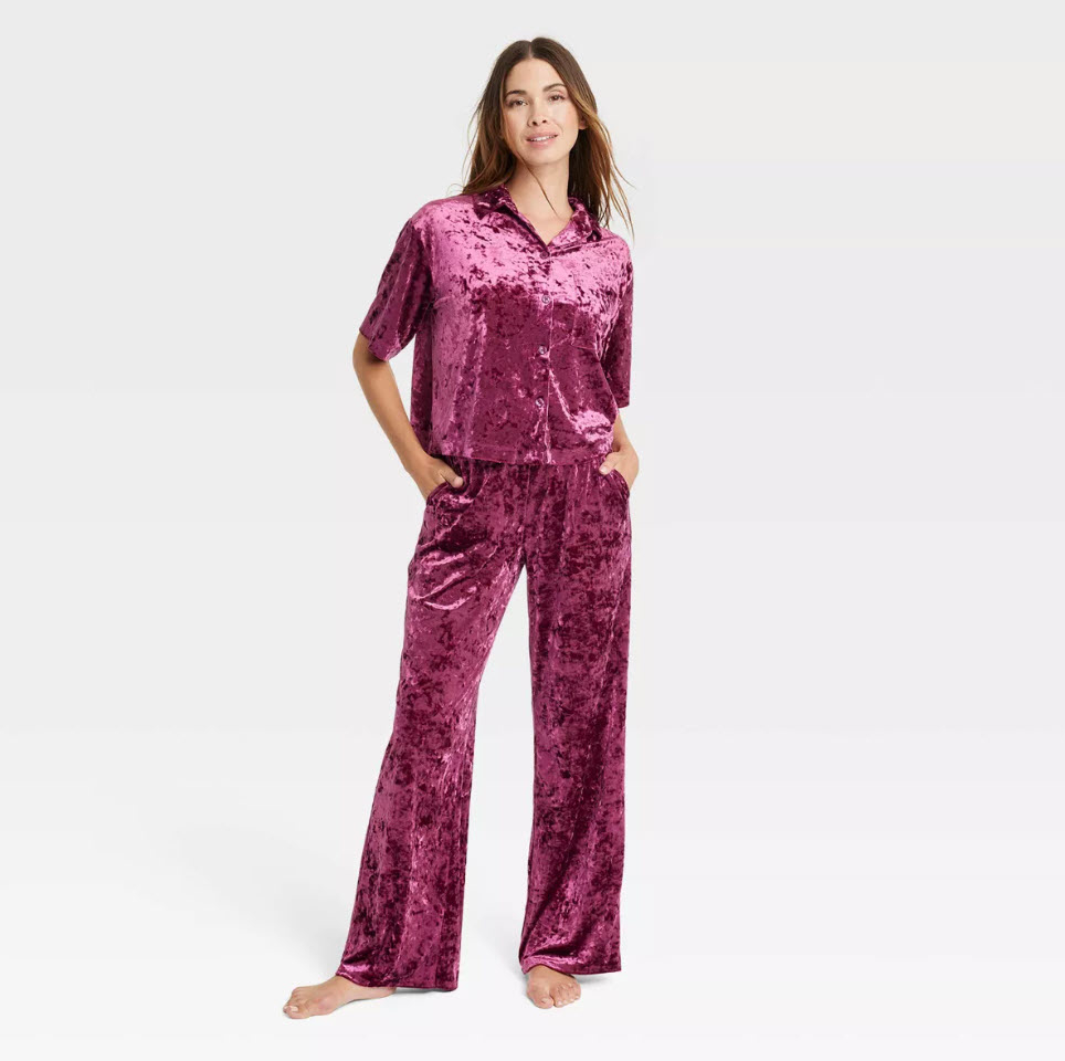 model wearing matching velvet pink pajama set