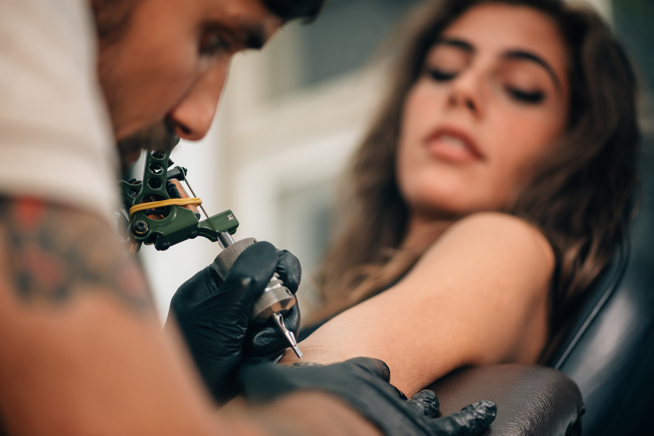person getting a tattoo