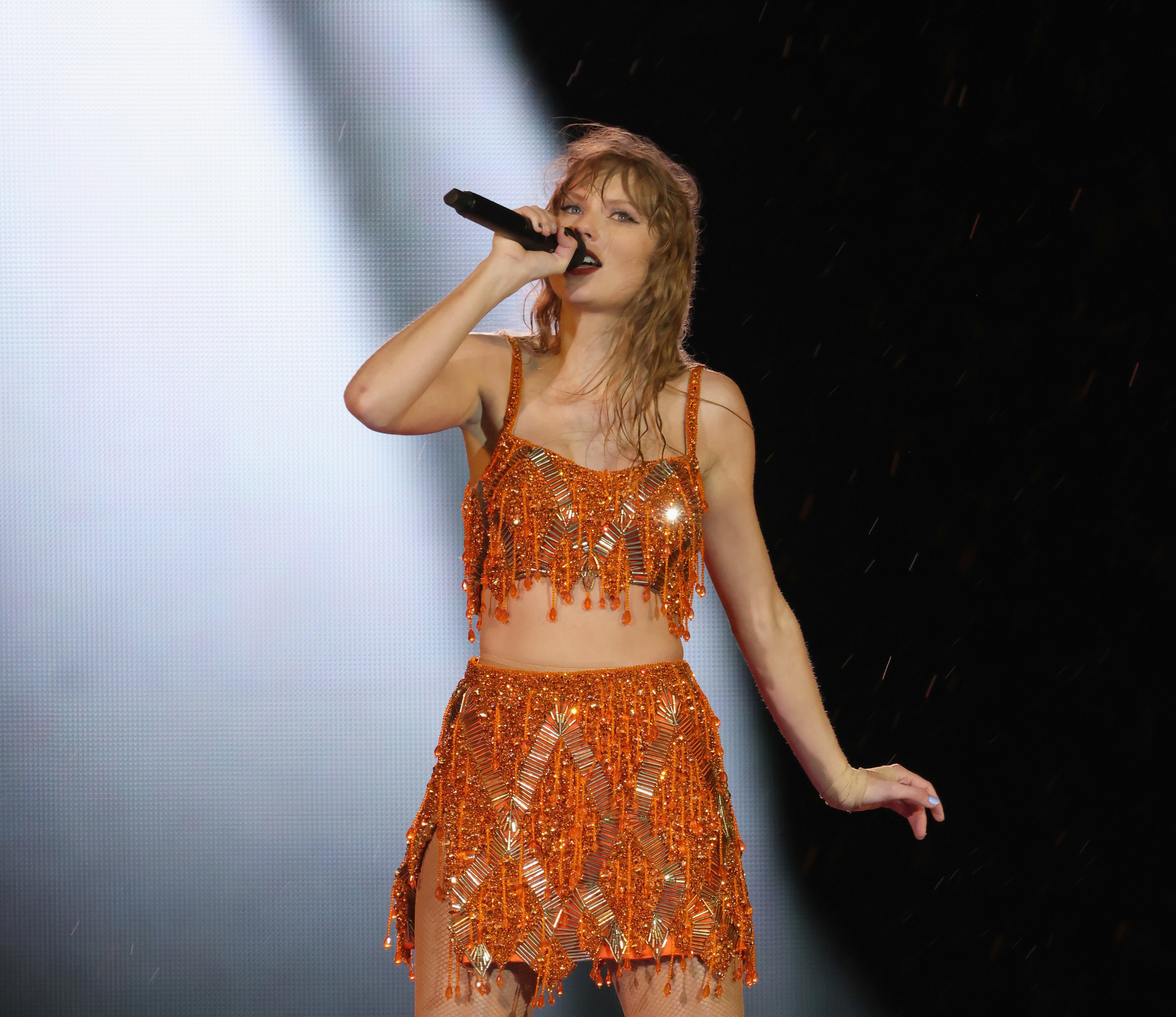 Close-up of Taylor performing