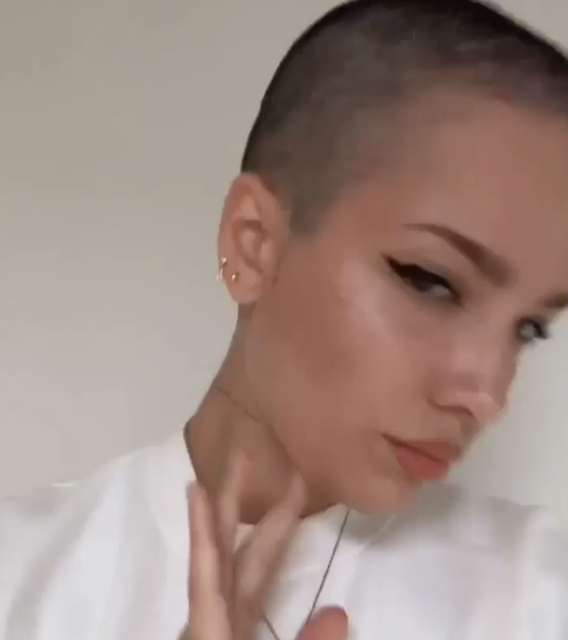 selfie of her shaved head